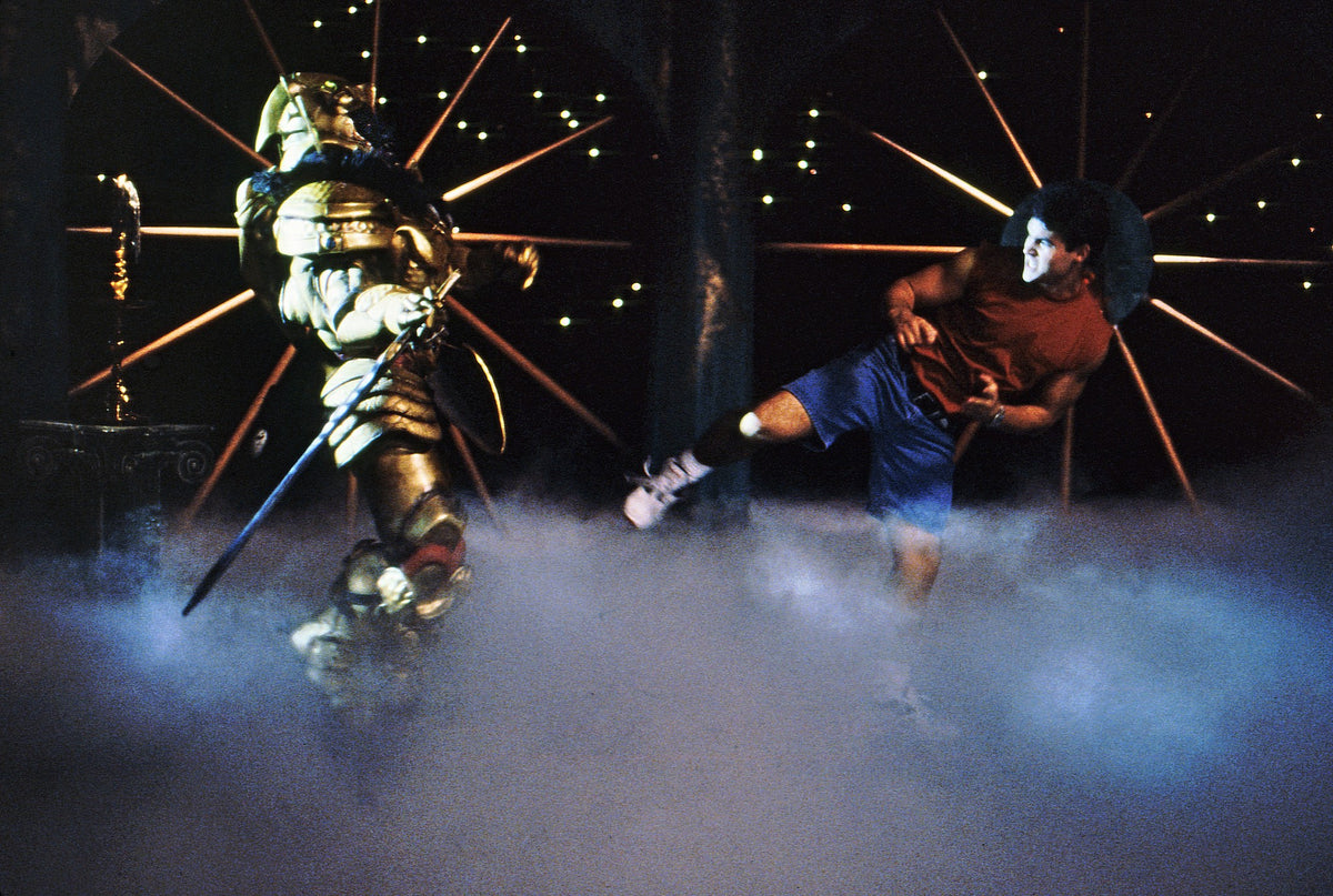 Red Ranger Jason side-kicking Goldar in the Dark Dimension during Green with Evil, hand-signed by Austin St. John