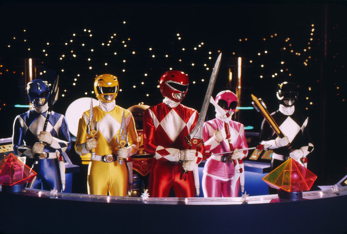 Mighty Morphin Power Rangers holding their Power Weapon props, made by prop man Mark Richardson, hand-signed by Austin St. John