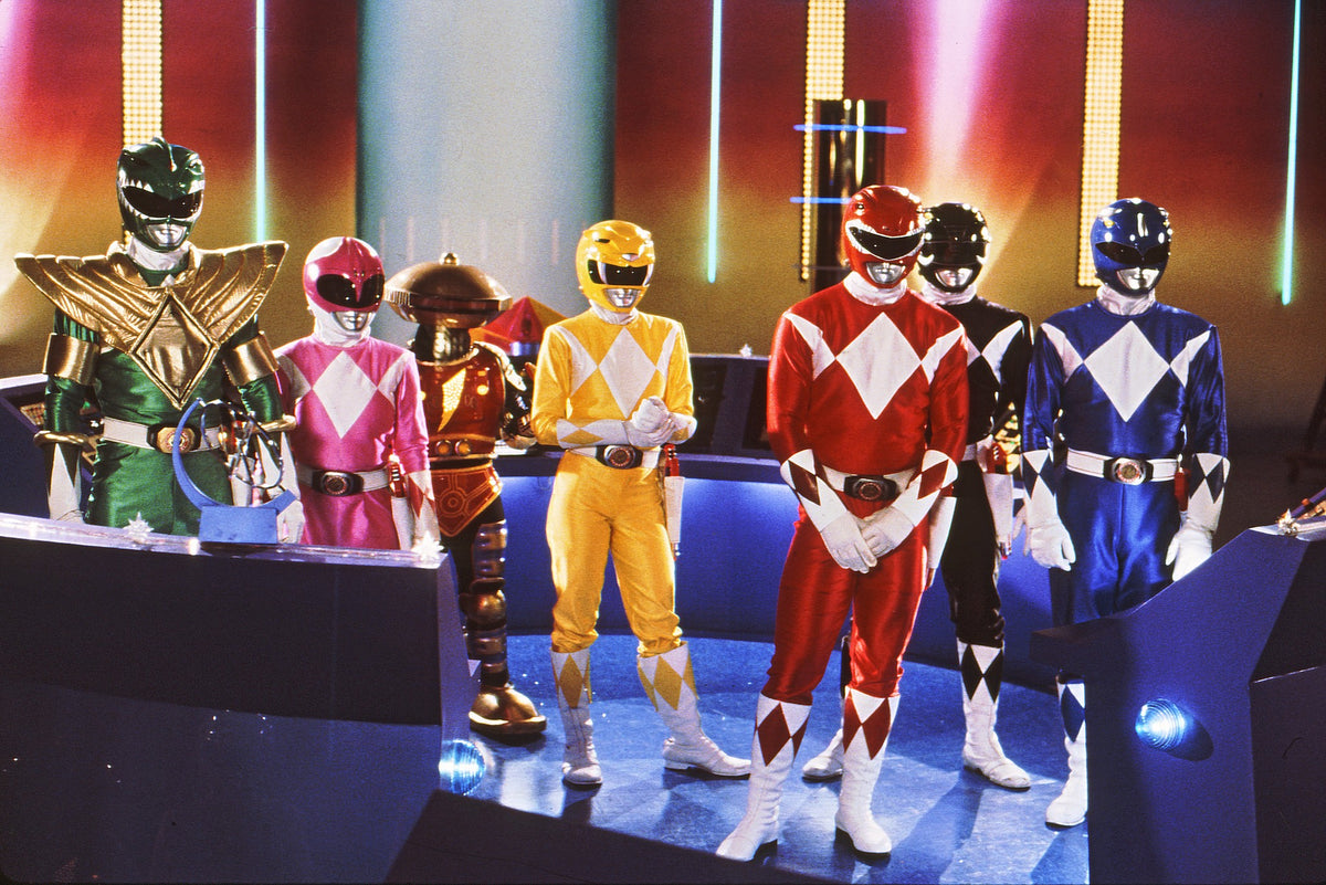 All five original Mighty Morphin Power Rangers standing on set during blocking, behind-the-scenes photo hand-signed by Austin St. John
