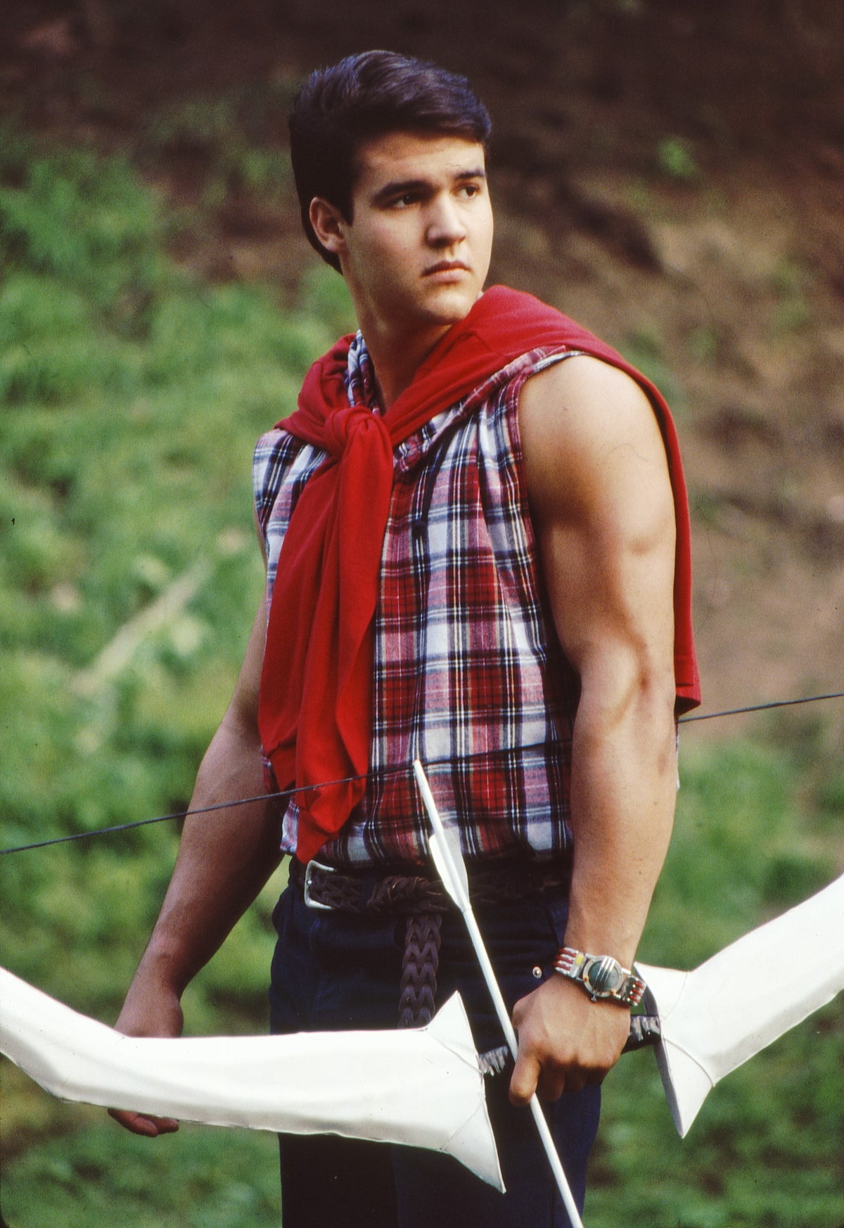 Austin St. John walking off set holding Kimberly's Power Bow prop, behind-the-scenes photo hand-signed by Austin St. John